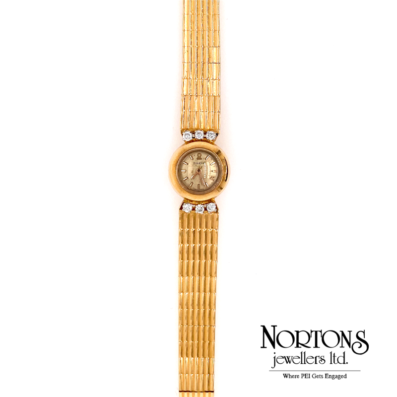 18 Karat Yellow Gold Omega Watch With 6 Diamonds .27 Carat TW Nortons Jewellers Ltd